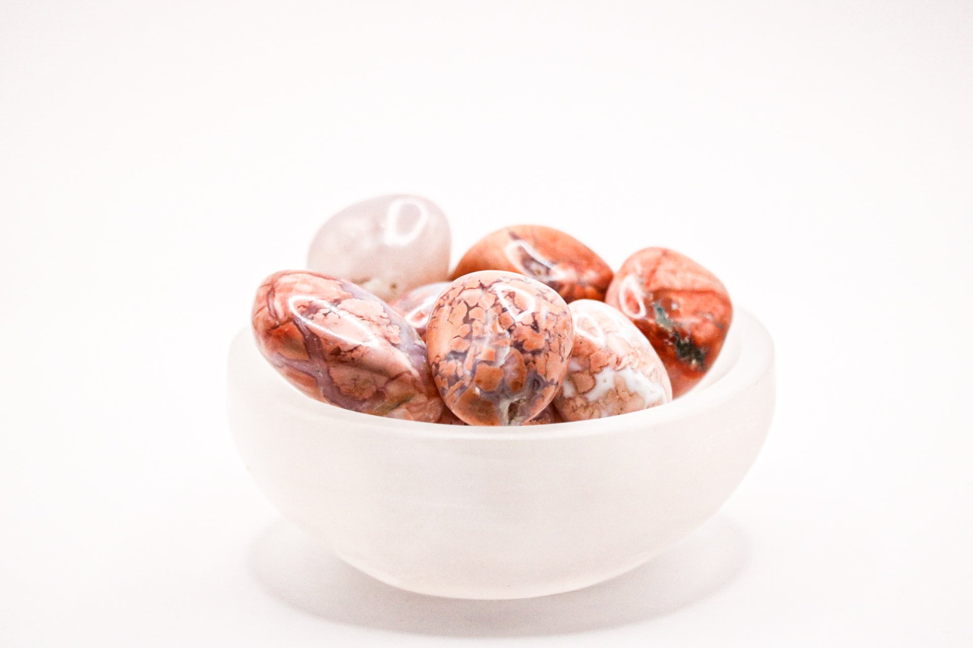 Pink agate tumbles